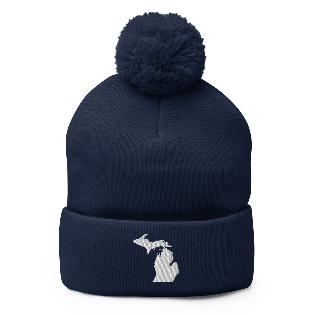 Navy Blue pom-pom beanie with Michigan embroidered in white on the front