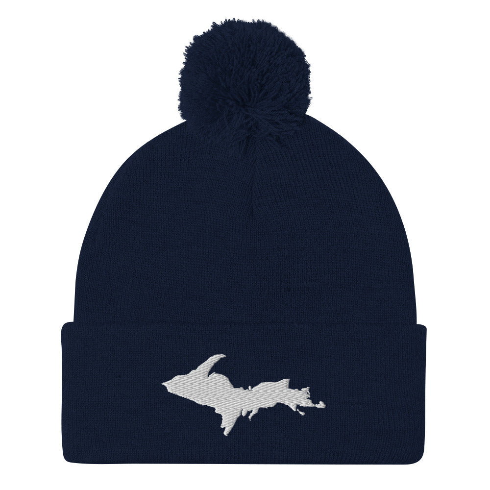 Navy Blue pom-pom beanie with Michigan's Upper Peninsula  embroidered in white on the front